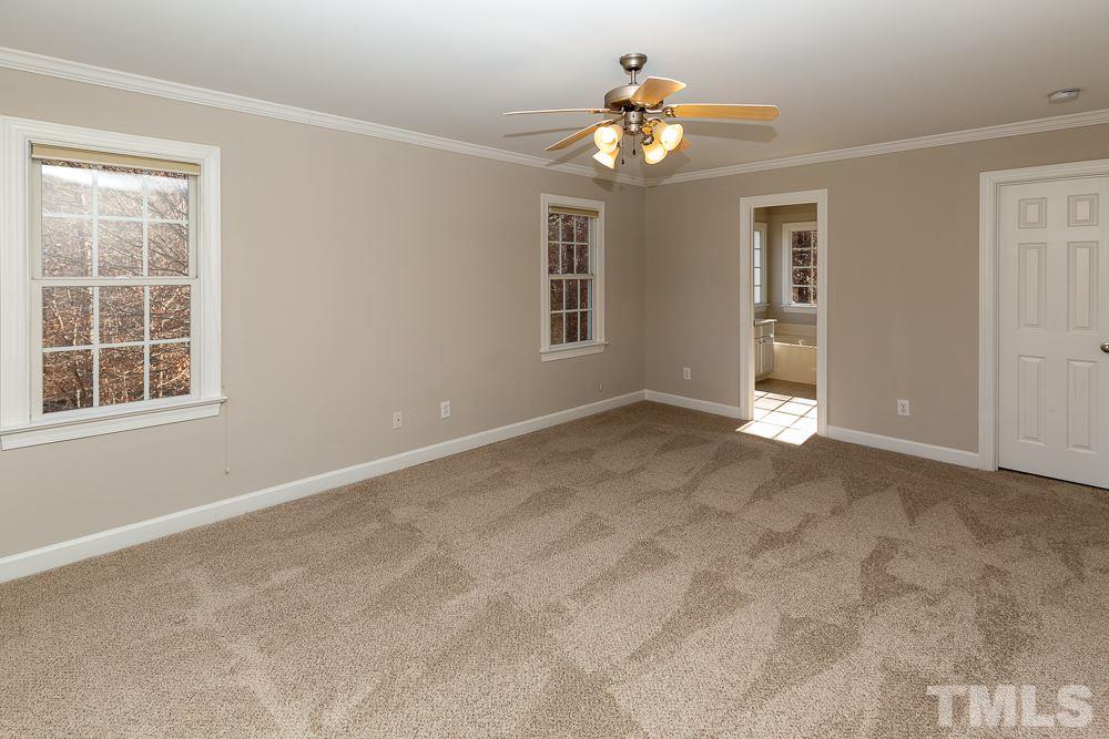5001 Perception Lane Raleigh, NC 27613 - Photo 13 of 28 a view of an empty room with a window