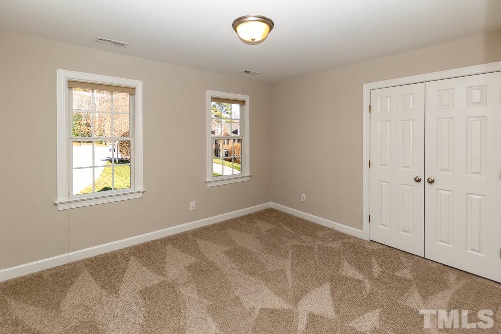 5001 Perception Lane Raleigh, NC 27613 - Photo 17 of 28 a view of an empty room with a window