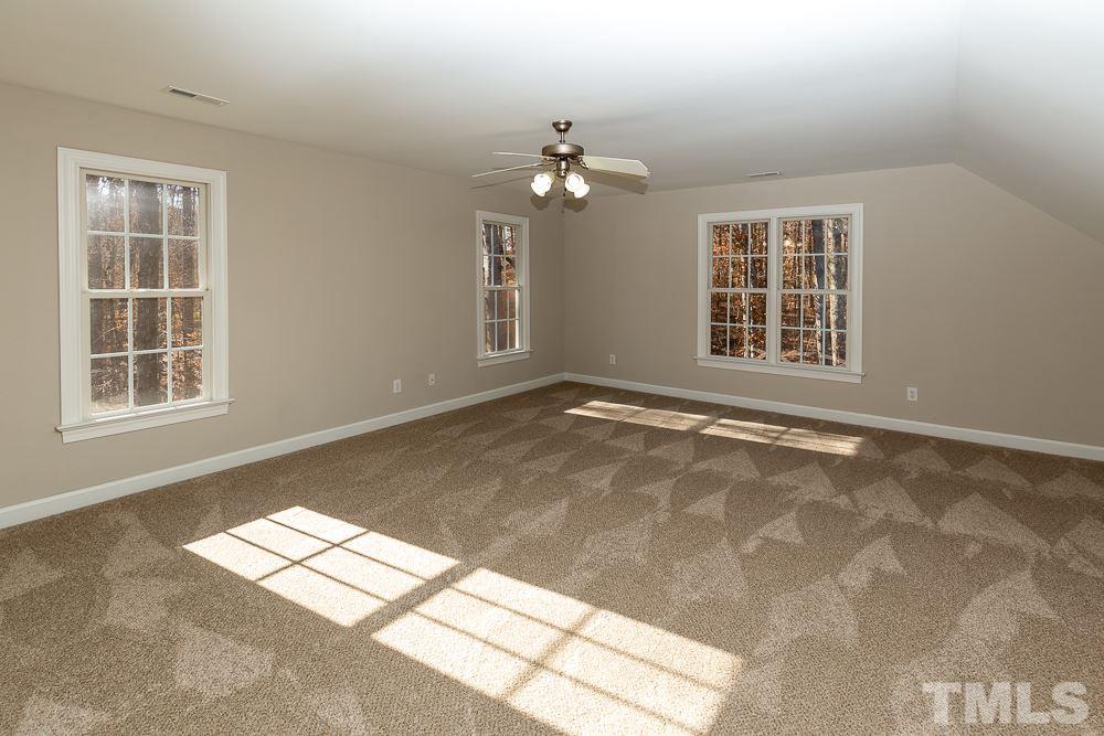 5001 Perception Lane Raleigh, NC 27613 - Photo 18 of 28 a view of an empty room with a window