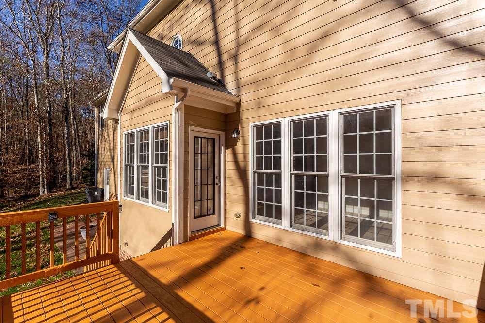 5001 Perception Lane Raleigh, NC 27613 - Photo 24 of 28 a view of a house with a large window