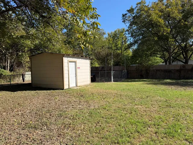 a house with trees in front of it