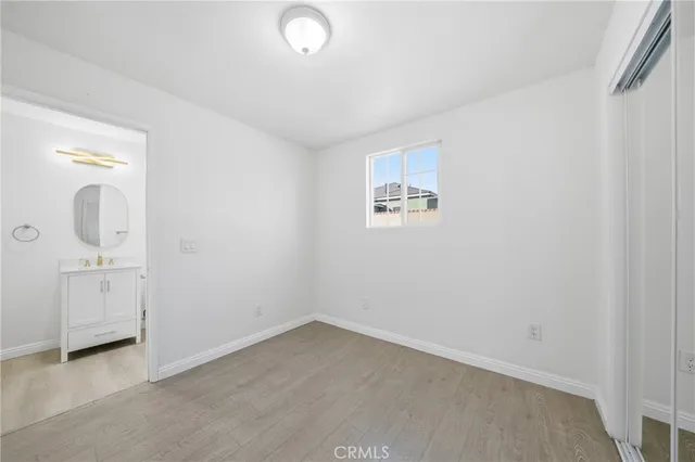 an empty room with a bathroom