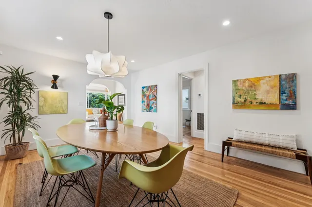 a kitchen with stainless steel appliances granite countertop a stove a sink dishwasher and a refrigerator