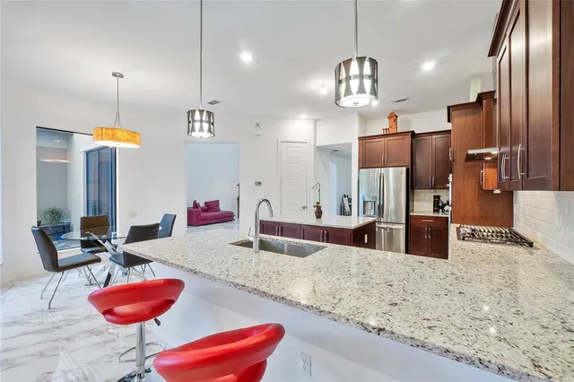 a view of a dining room with furniture window and outside view