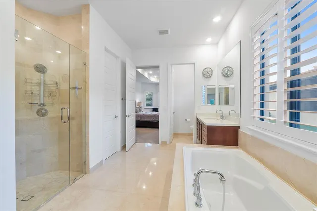 a view of bathroom with dual sinks