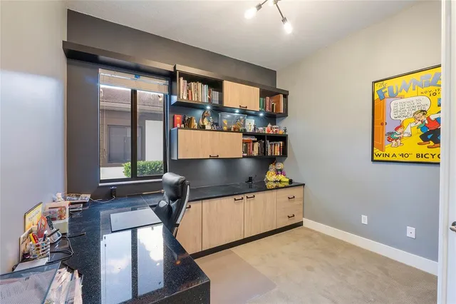 a bathroom with a double vanity sink mirror and toilet