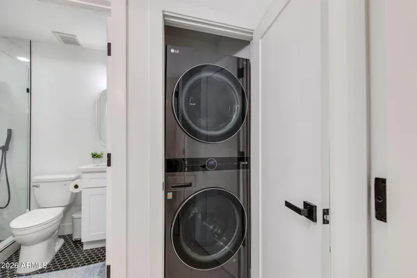 a bathroom with a toilet and a sink
