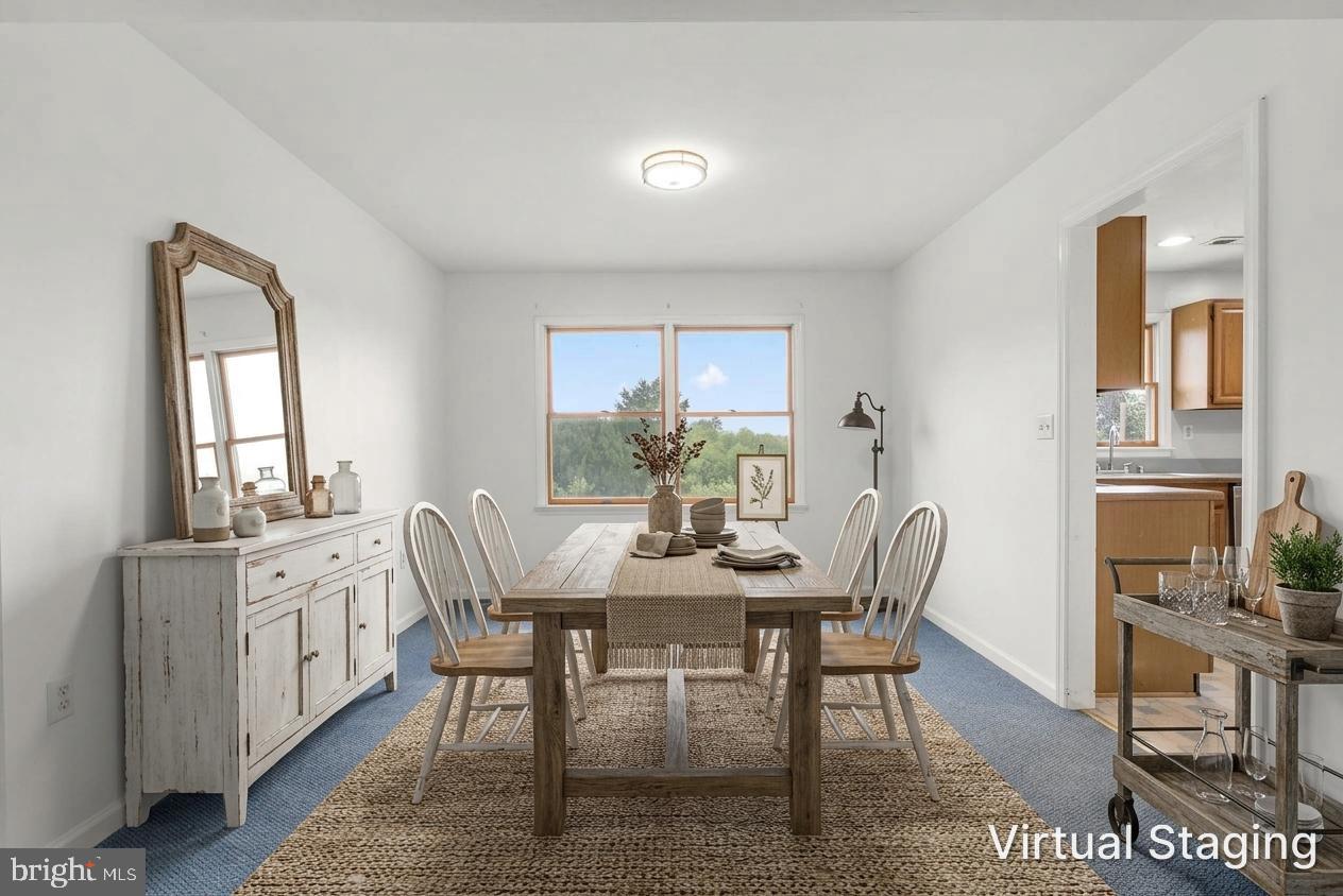 3050 Hooper Road New Windsor, MD 21776 - Photo 9 of 63 Formal dining - virtually staged