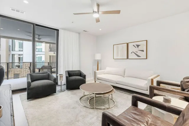 a bedroom with a bed and a mirror