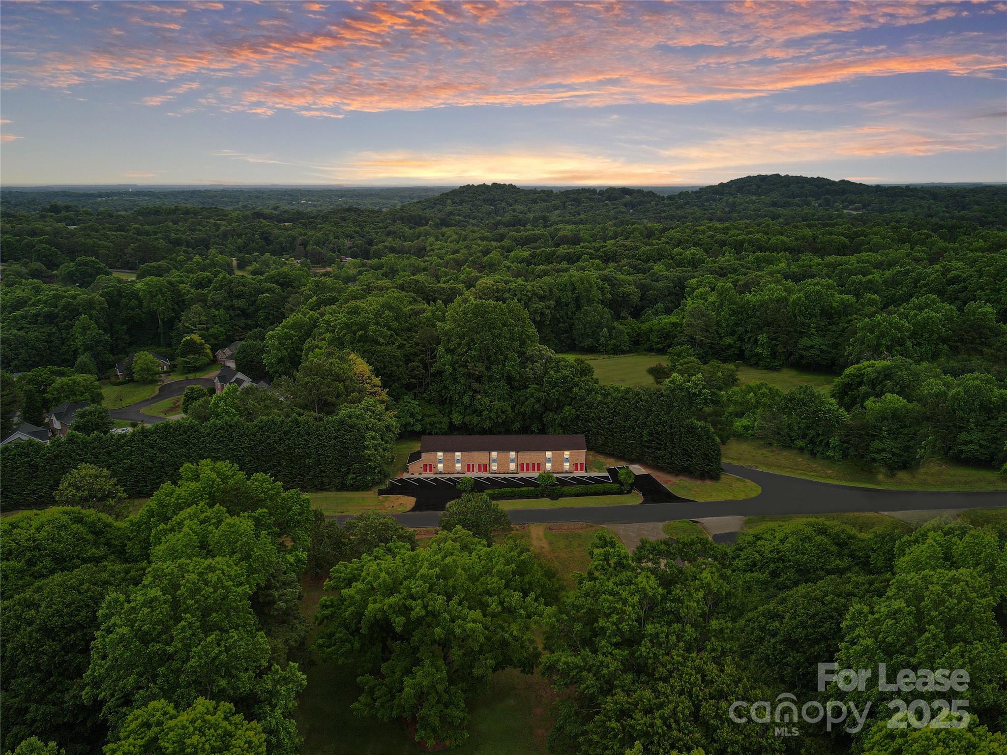 1850 Lowell Bethesda Road, Unit 6 Gastonia, NC 28056 - Photo 10 of 15 a view of a town with mountains in the background