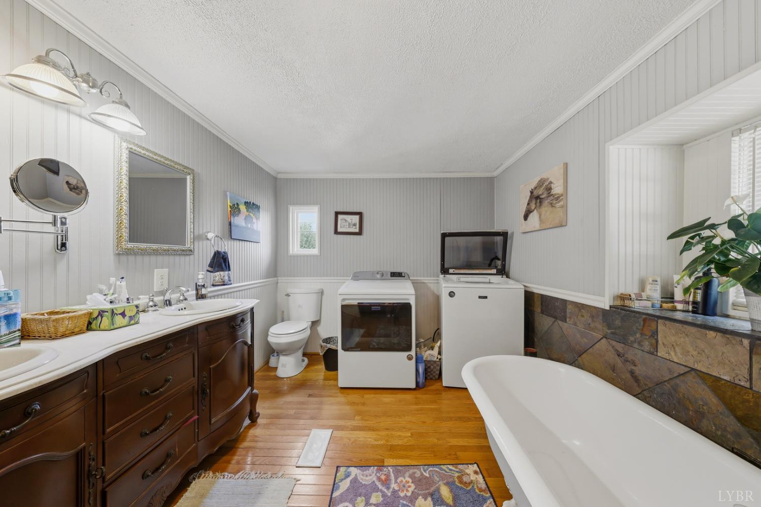 809 Plantation Road Amherst, VA 24521 - Photo 16 of 77 a spacious bathroom with a tub sink and mirror