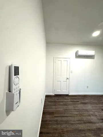 a view of a livingroom with wooden floor