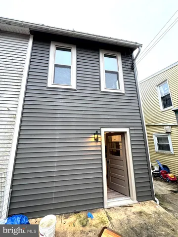 a view of a yard with an outdoor space