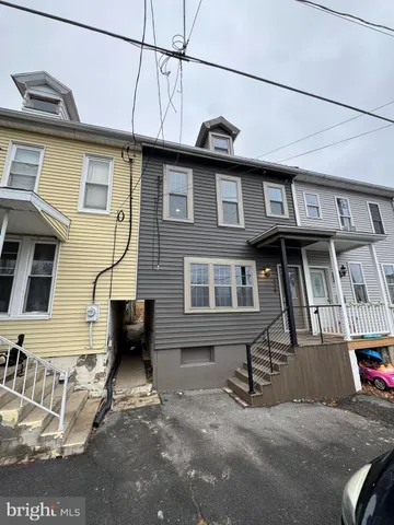 a front view of a house with balcony