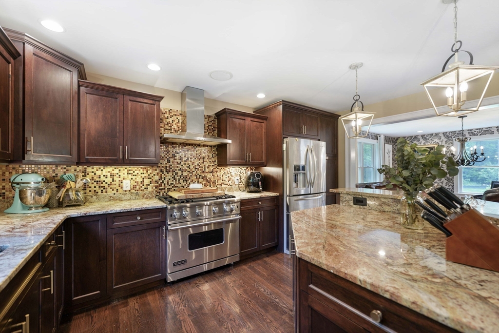 50 Elm Street Plympton, MA 02367 - Photo 13 of 40 a kitchen with stainless steel appliances granite countertop wooden cabinets and a sink