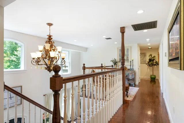 a view of a hallway view with staircase