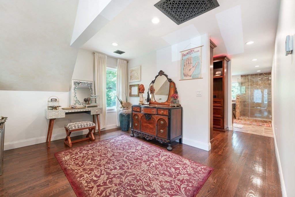 50 Elm Street Plympton, MA 02367 - Photo 26 of 40 a bedroom with furniture and a wooden floor