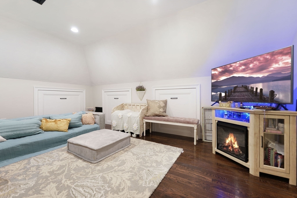 50 Elm Street Plympton, MA 02367 - Photo 30 of 40 a living room with furniture and a fireplace