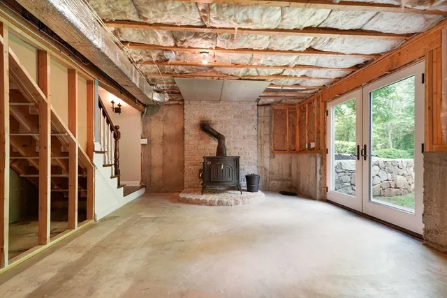 a view of an empty room with windows