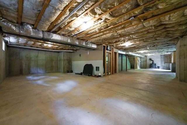 a car and bike parked in a garage