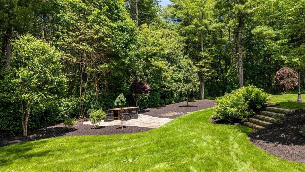 50 Elm Street Plympton, MA 02367 - Photo 38 of 40 a view of a patio with a table and chairs