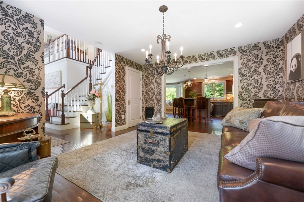 50 Elm Street Plympton, MA 02367 - Photo 9 of 40 a living room with furniture and a chandelier