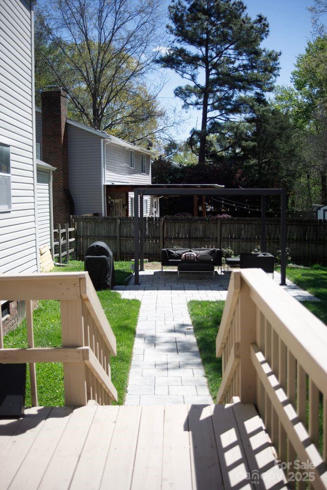 6718 Rollingridge Drive Charlotte, NC 28211 - Photo 4 of 6 a view of house and outdoor space