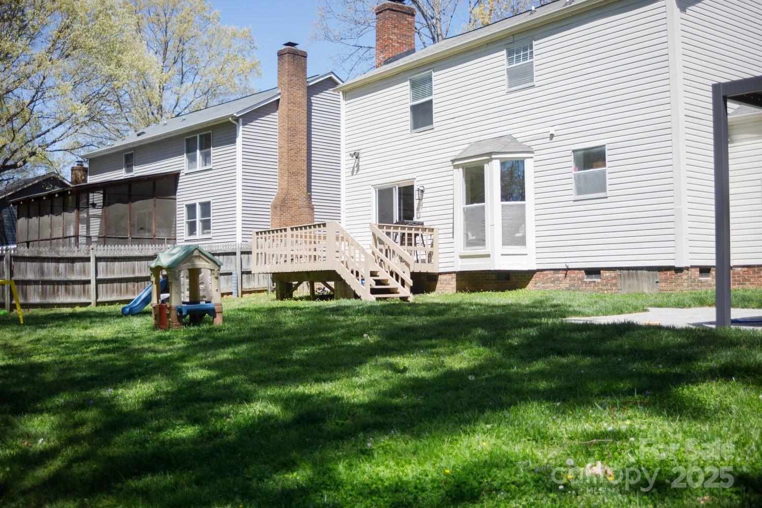 6718 Rollingridge Drive Charlotte, NC 28211 - Photo 6 of 6 a house view with a garden space