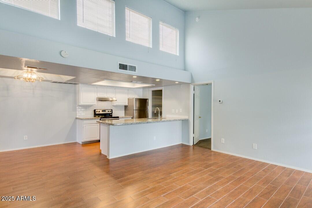 6900 East Gold Dust Avenue, Unit 149 Paradise Valley, AZ 85253 - Photo 13 of 34 a view of a kitchen with a sink and dishwasher