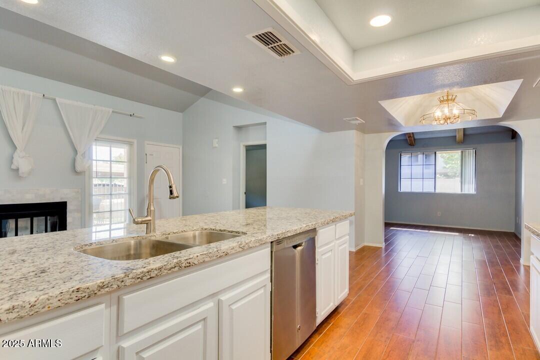 6900 East Gold Dust Avenue, Unit 149 Paradise Valley, AZ 85253 - Photo 18 of 34 a kitchen with sink and mirror