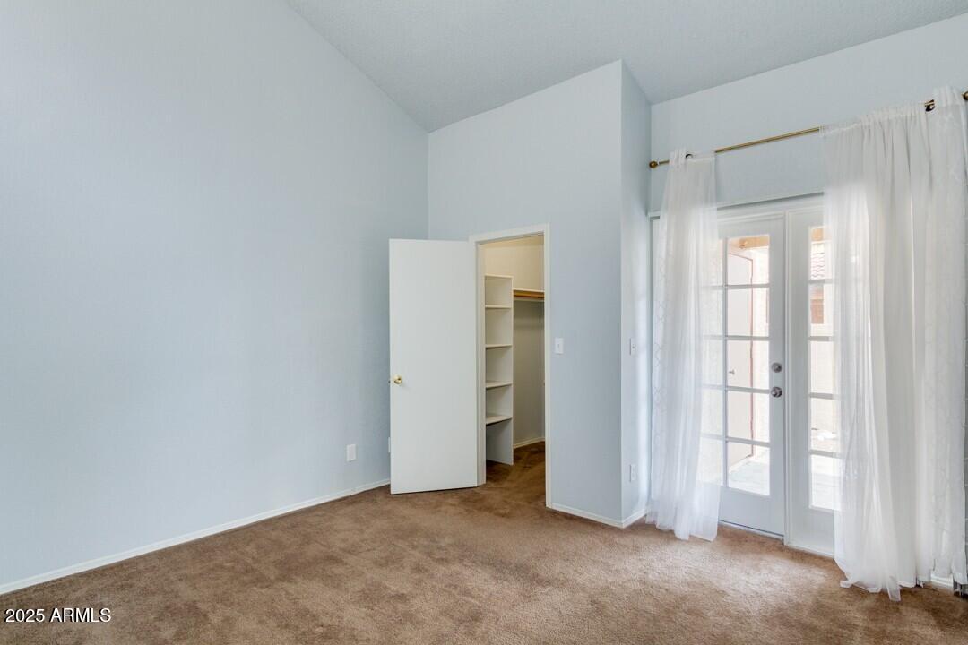 6900 East Gold Dust Avenue, Unit 149 Paradise Valley, AZ 85253 - Photo 23 of 34 a view of an empty room with closet area