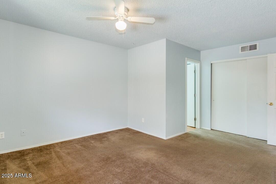 6900 East Gold Dust Avenue, Unit 149 Paradise Valley, AZ 85253 - Photo 28 of 34 a view of empty room