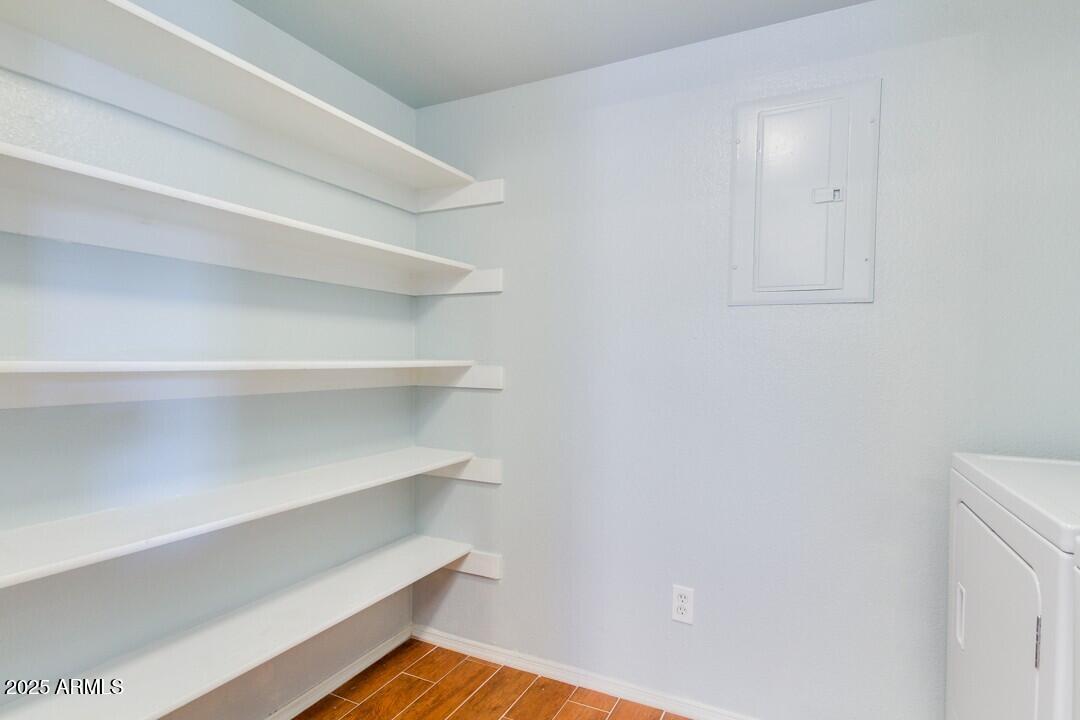 6900 East Gold Dust Avenue, Unit 149 Paradise Valley, AZ 85253 - Photo 32 of 34 a view of walk in closet with empty racks