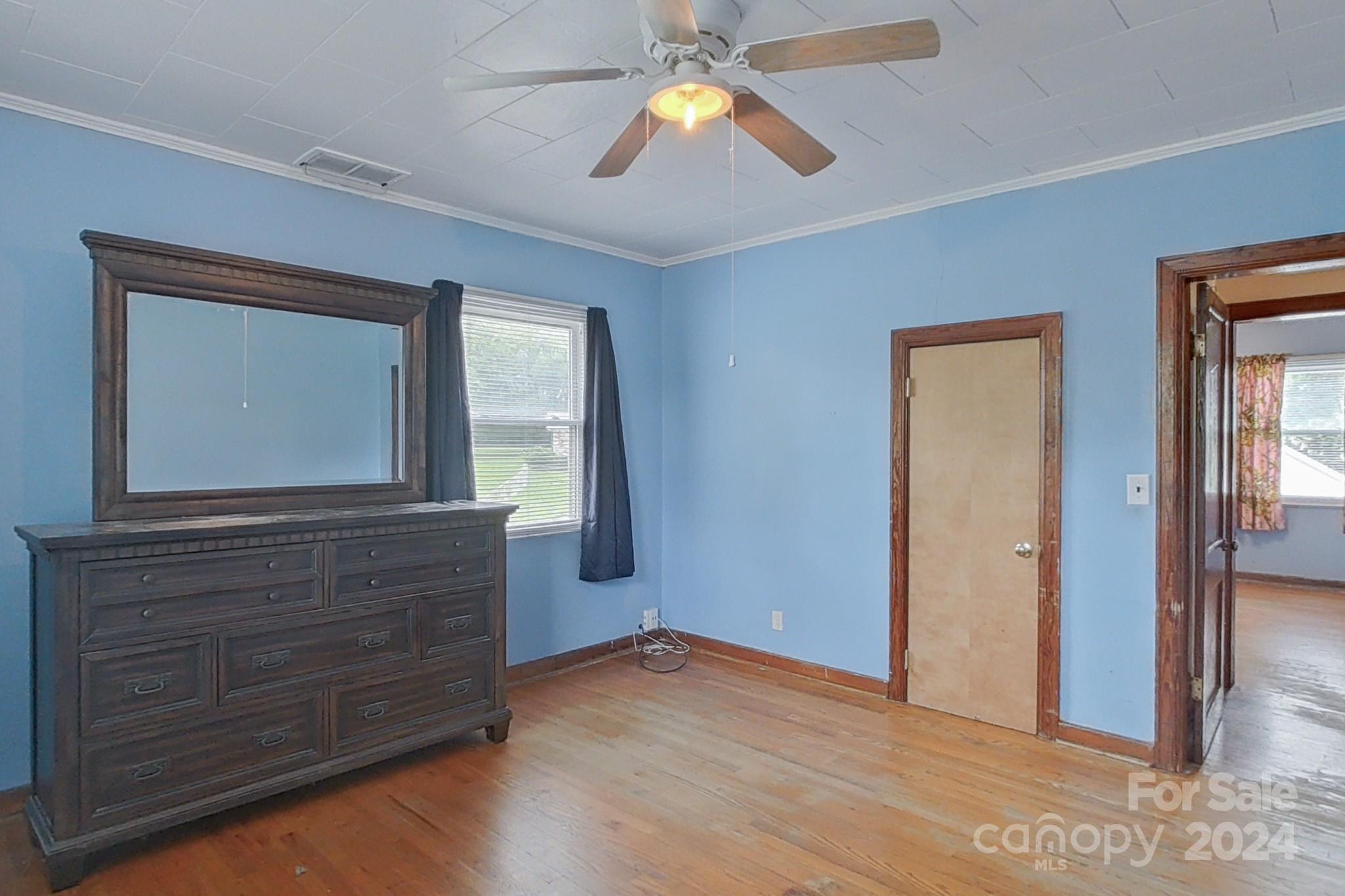 700 South Myrtle School Road Gastonia, NC 28052 - Photo 21 of 40 a view of empty room with wooden floor