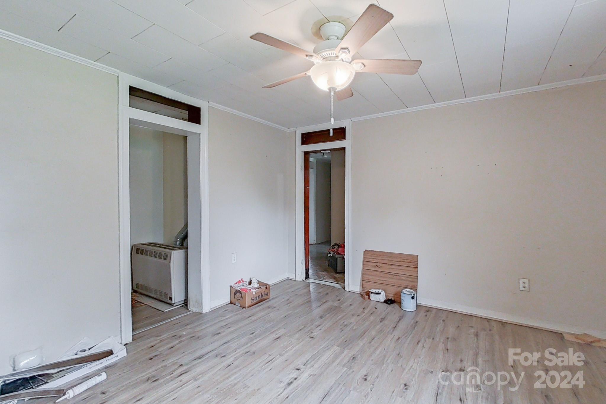 700 South Myrtle School Road Gastonia, NC 28052 - Photo 27 of 40 wooden floor in a hall with an empty room