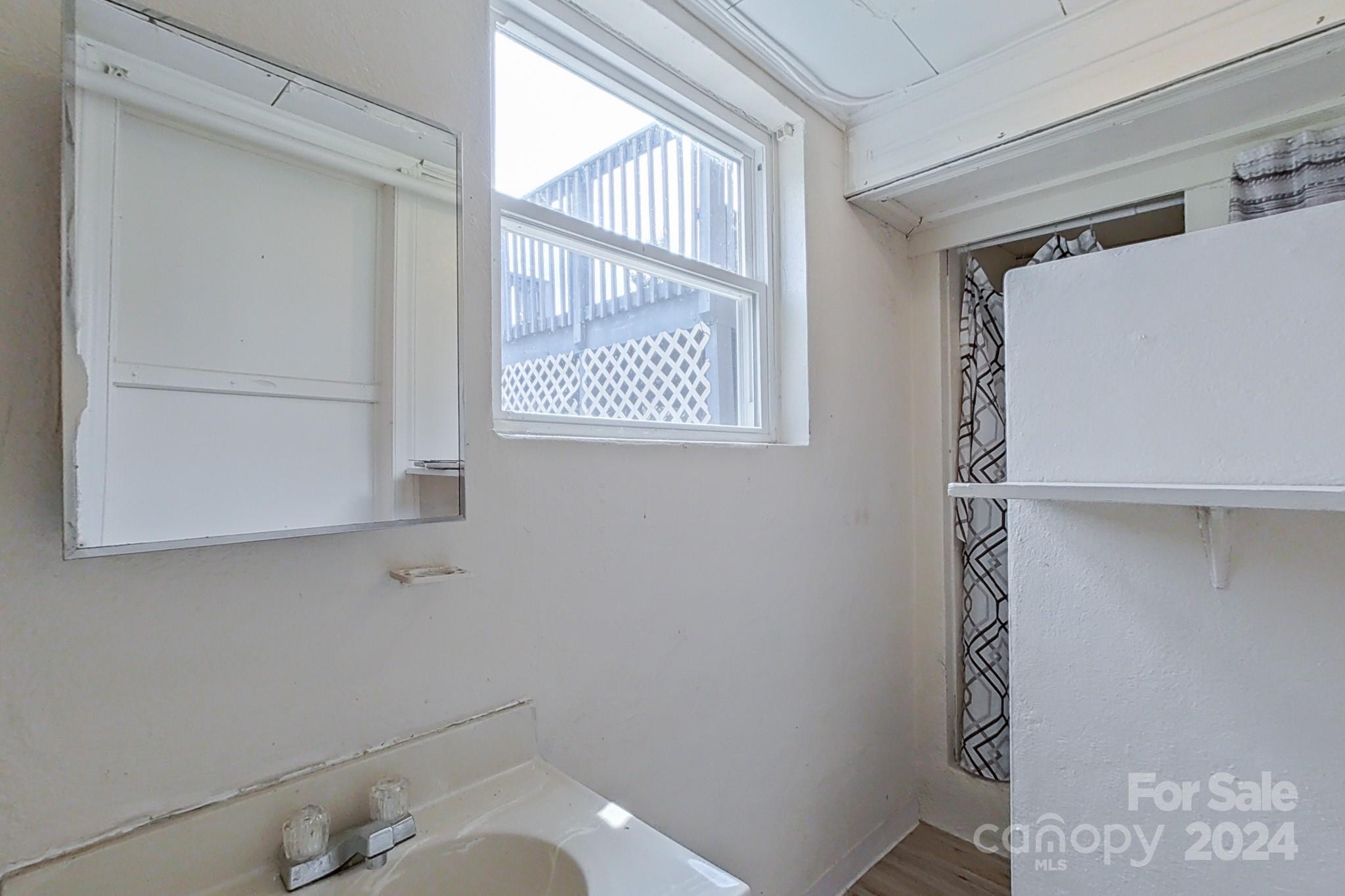 700 South Myrtle School Road Gastonia, NC 28052 - Photo 30 of 40 a bathroom with a toilet and a sink