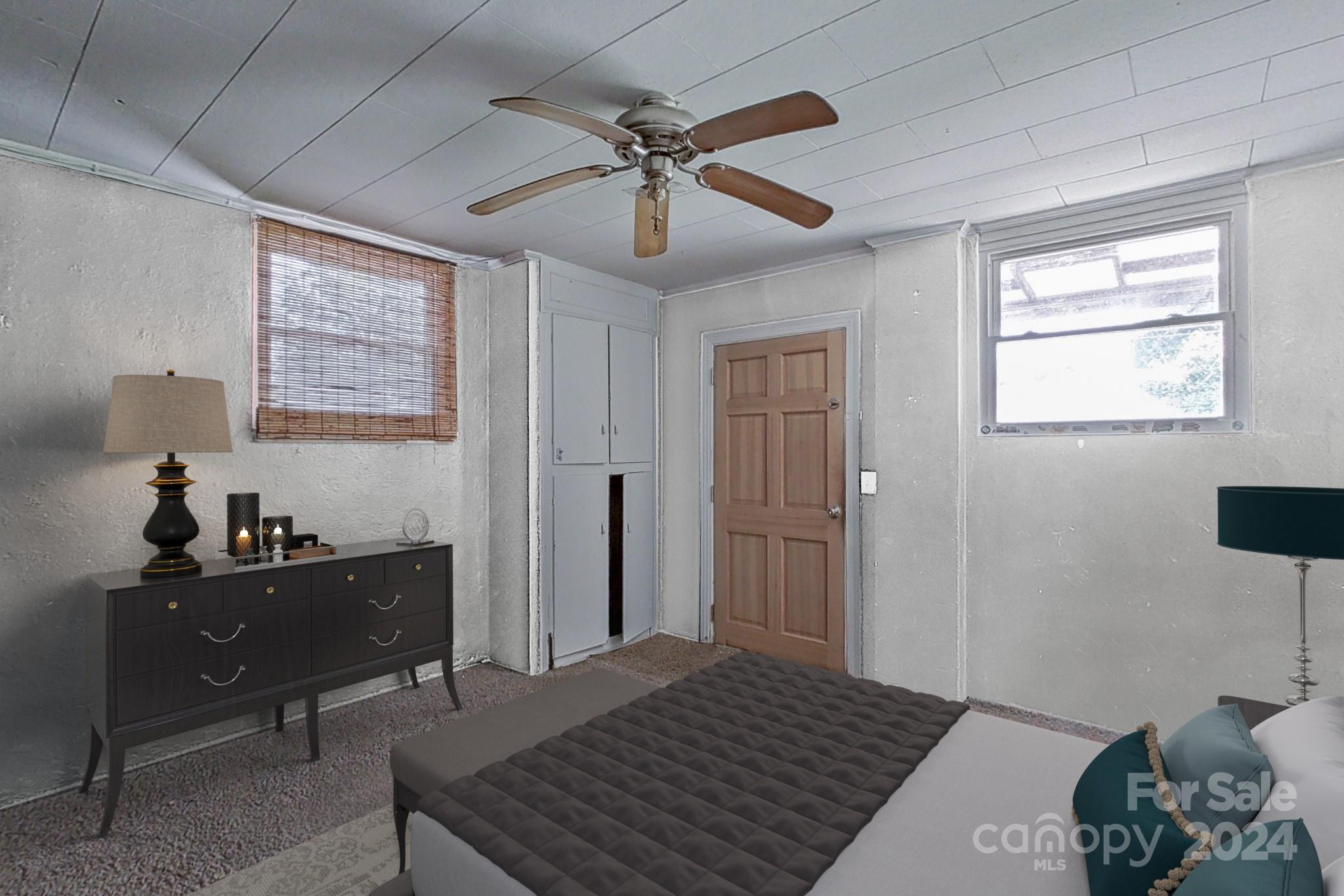 700 South Myrtle School Road Gastonia, NC 28052 - Photo 5 of 40 a bedroom with a bed and a window