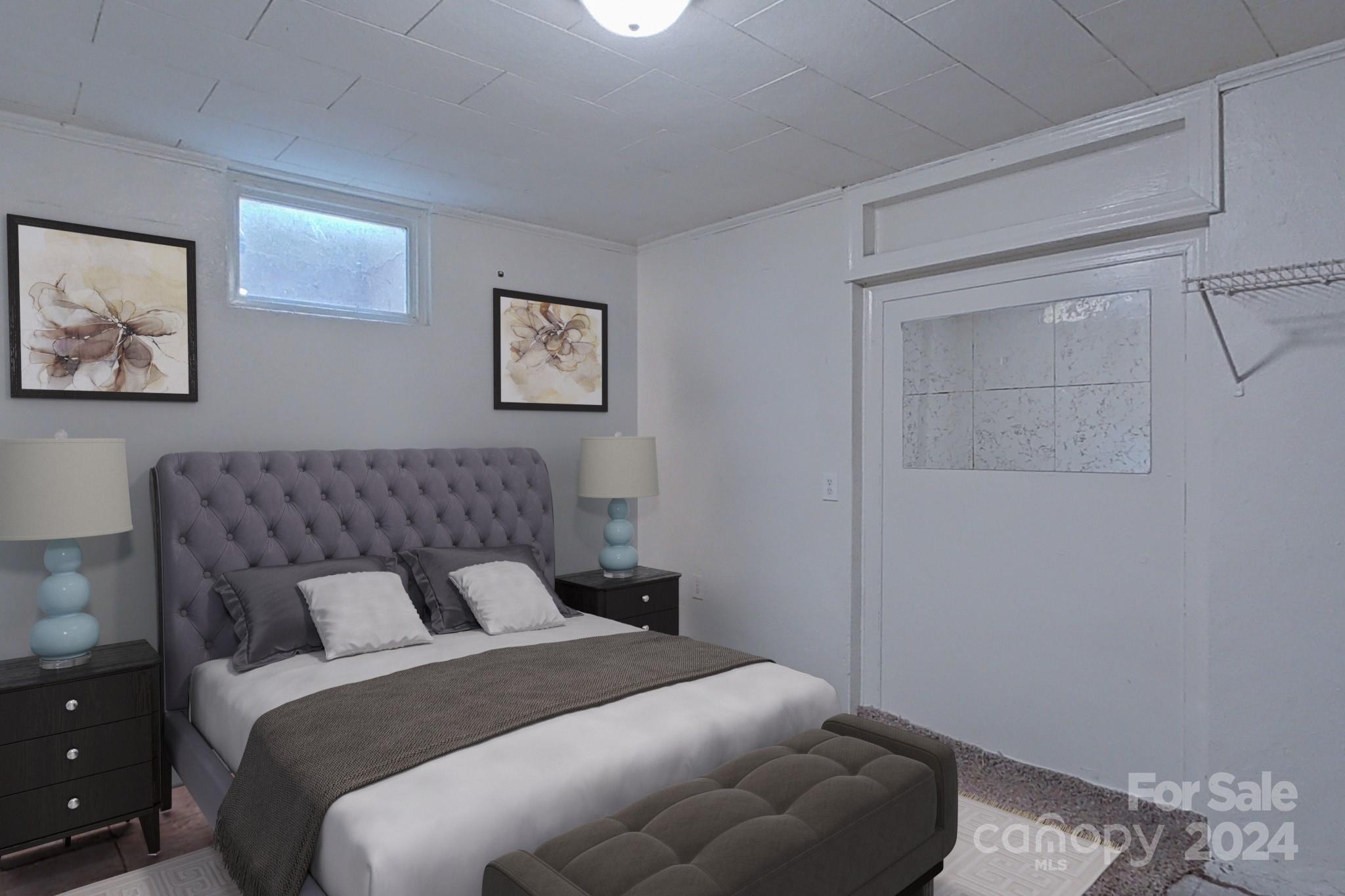 700 South Myrtle School Road Gastonia, NC 28052 - Photo 7 of 40 a bedroom with a bed and a couch