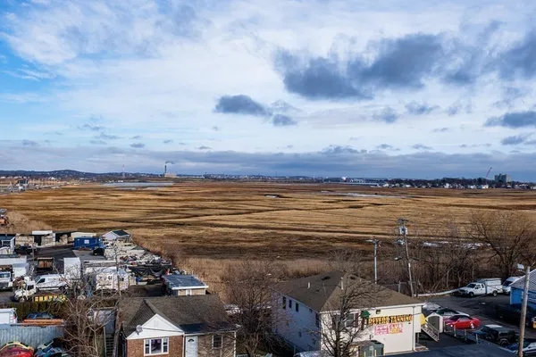 a view of a city and ocean view