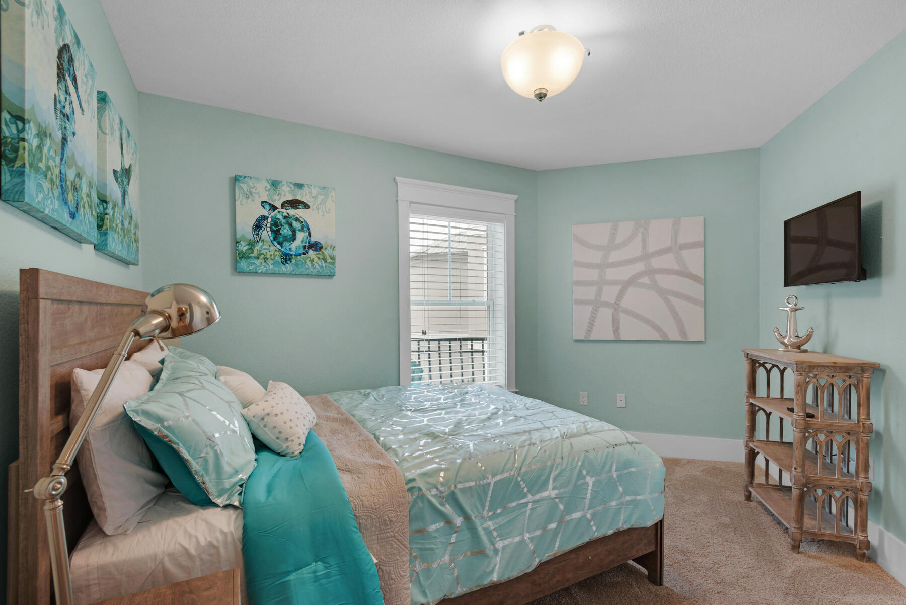 18 Merri Way Santa Rosa Beach, FL 32459 - Photo 18 of 49 a bedroom with a bed and a flat screen tv