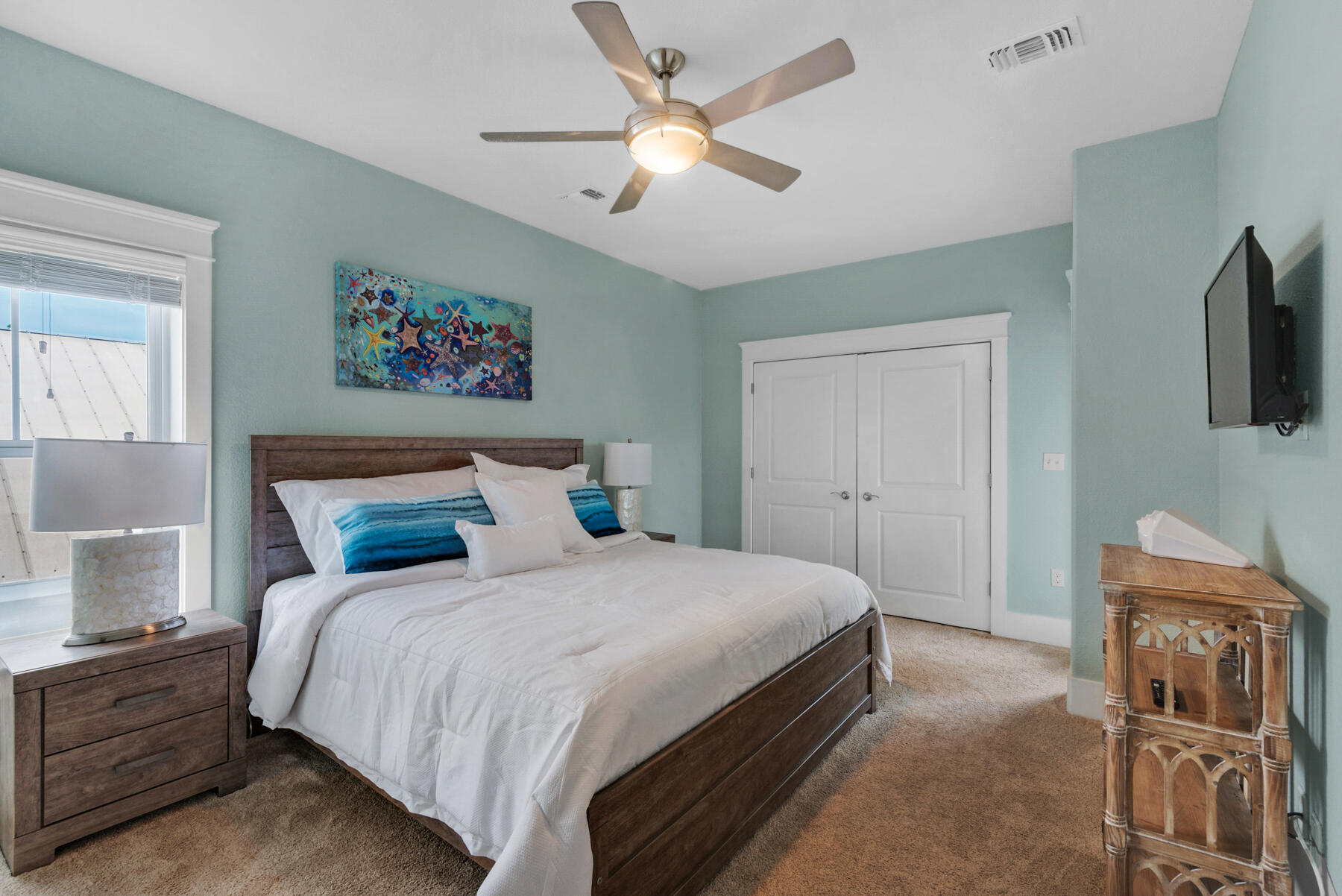 18 Merri Way Santa Rosa Beach, FL 32459 - Photo 21 of 49 a bedroom with a bed and a chandelier