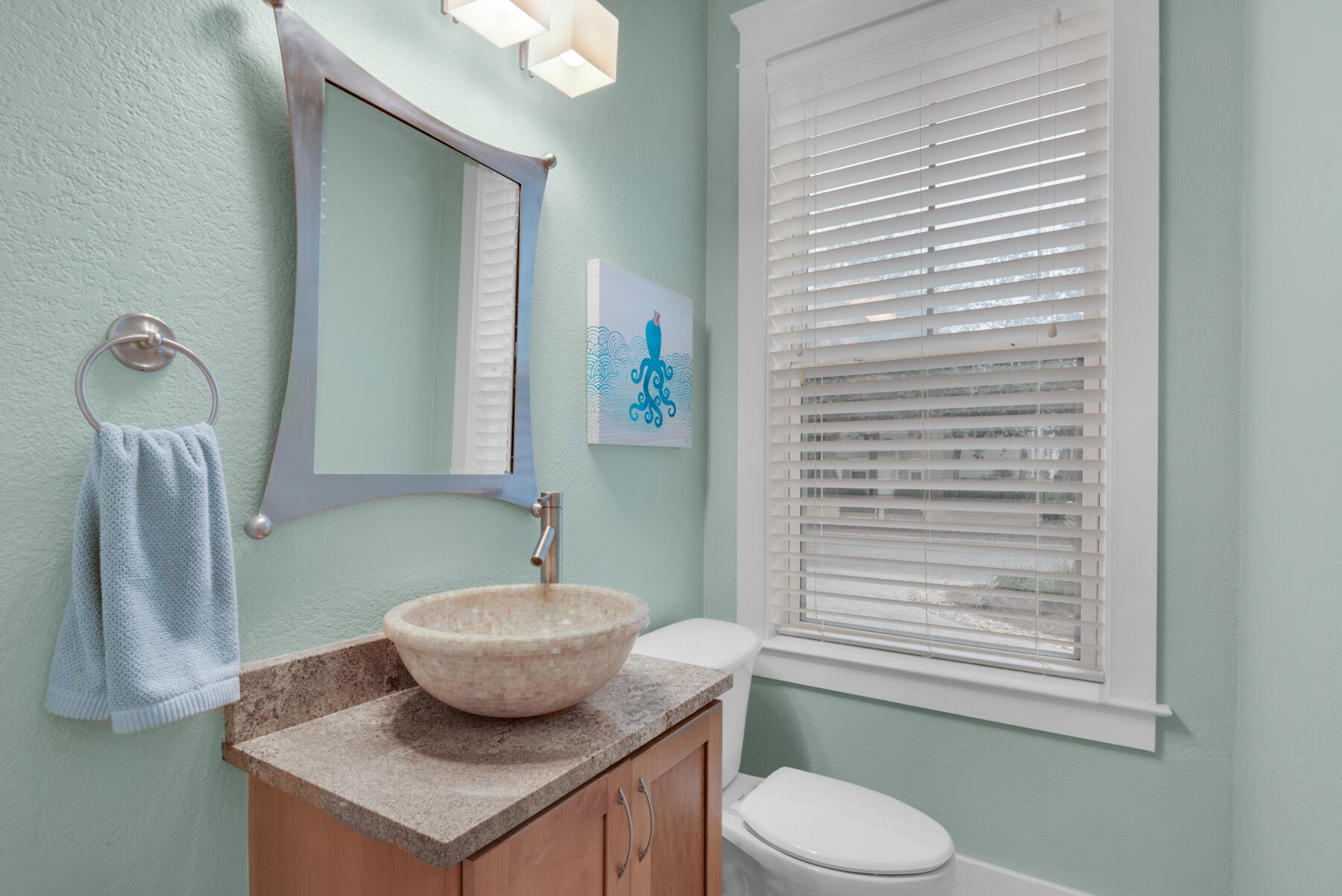 18 Merri Way Santa Rosa Beach, FL 32459 - Photo 9 of 49 a bathroom with a toilet a sink and mirror