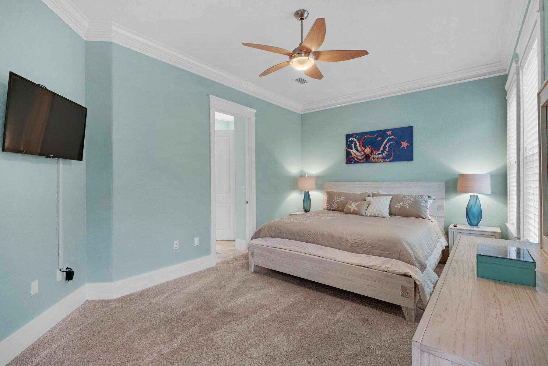 18 Merri Way Santa Rosa Beach, FL 32459 - Photo 10 of 49 a spacious bedroom with a bed and a flat screen tv