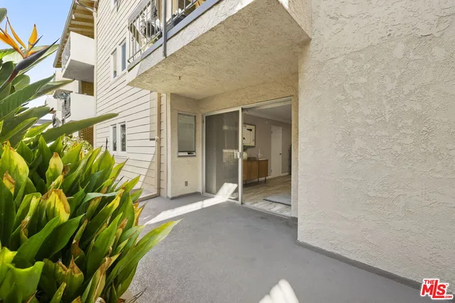a view of a front door and outdoor space