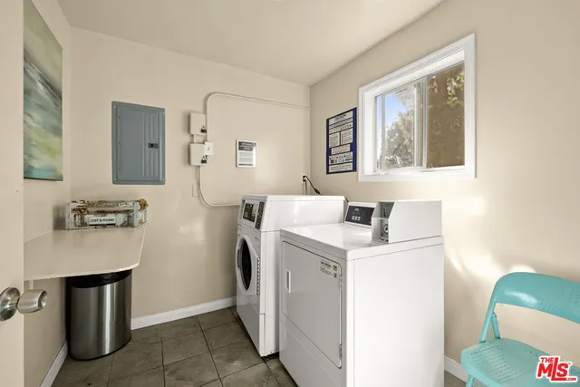 a storage room with washer and dryer