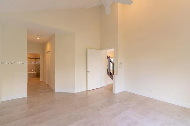 a view of a room with a hallway