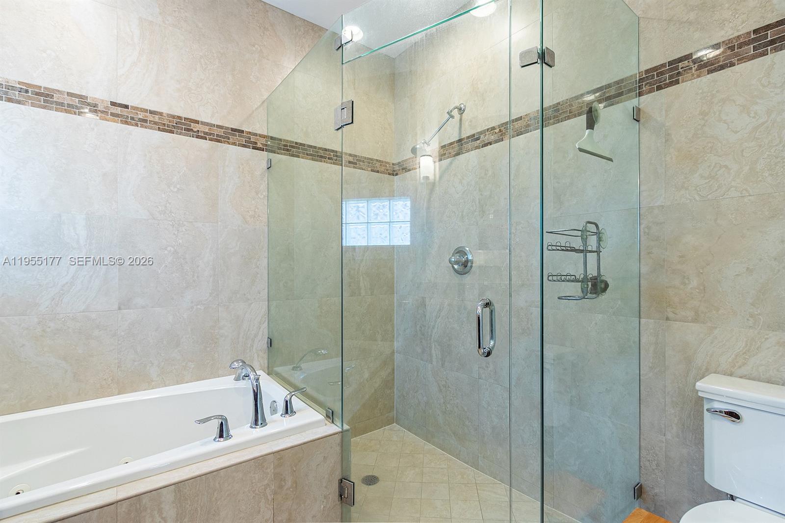 7387 Panache Way Boca Raton, FL 33433 - Photo 21 of 53 a bathroom with a shower and a toilet