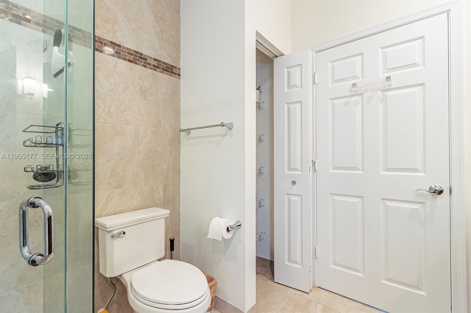 7387 Panache Way Boca Raton, FL 33433 - Photo 22 of 53 a white toilet sitting next to a bathroom
