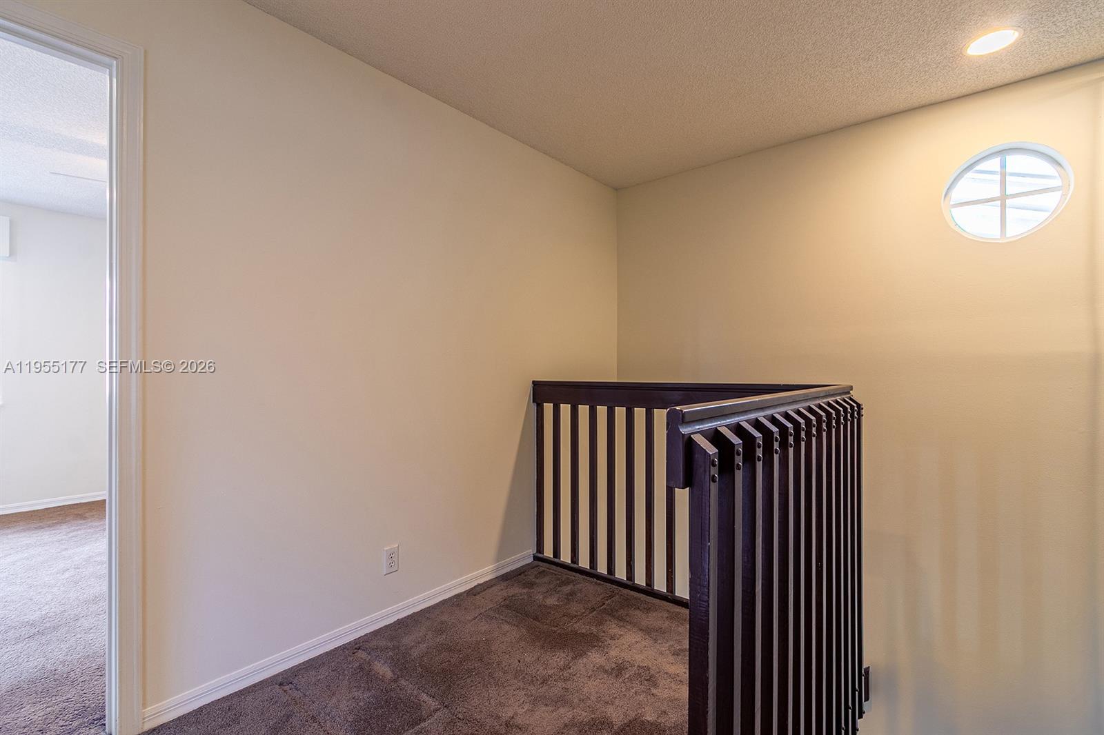 7387 Panache Way Boca Raton, FL 33433 - Photo 24 of 53 a view of a room with staircase