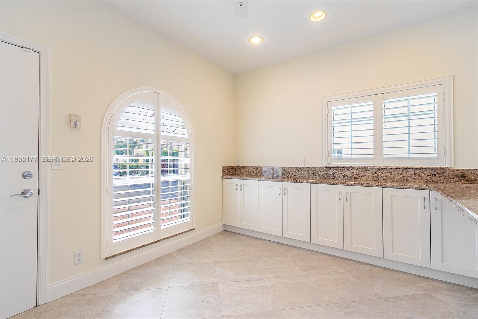 7387 Panache Way Boca Raton, FL 33433 - Photo 10 of 53 a view of an empty room and a window